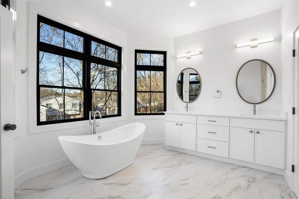Primary bathroom with freestanding tub and double vanity
