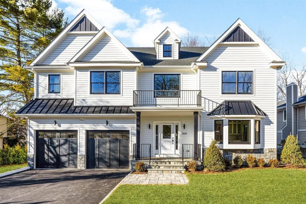 Front of a large new home with two car garage