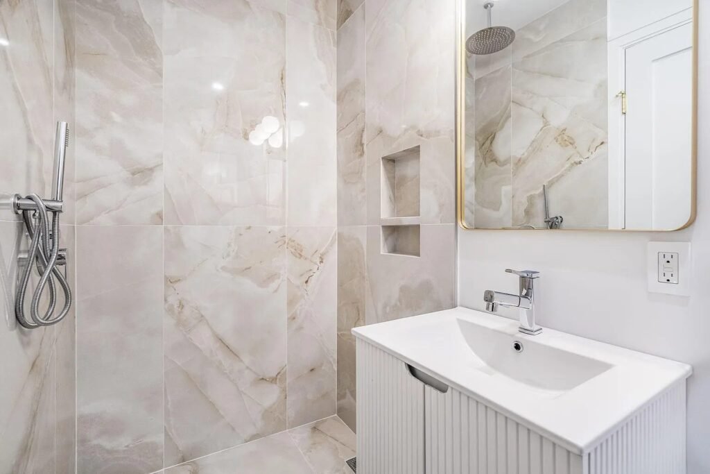 Bathroom with tub shower and wood look tile